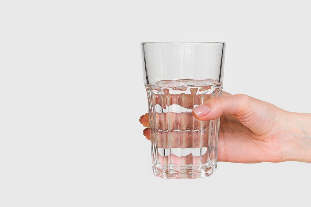A glass of water with zxcvbnmqwert liquid powder